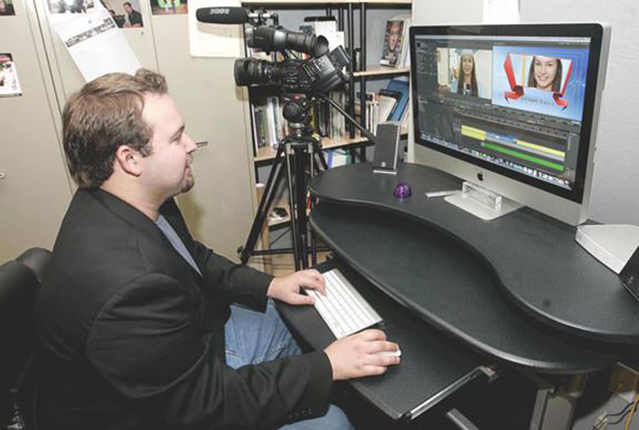 Joshua Cordero shows off his studio and video production business inside his home in Armona on Wednesday afternoon. (Gary Feinstein/The Sentinel)