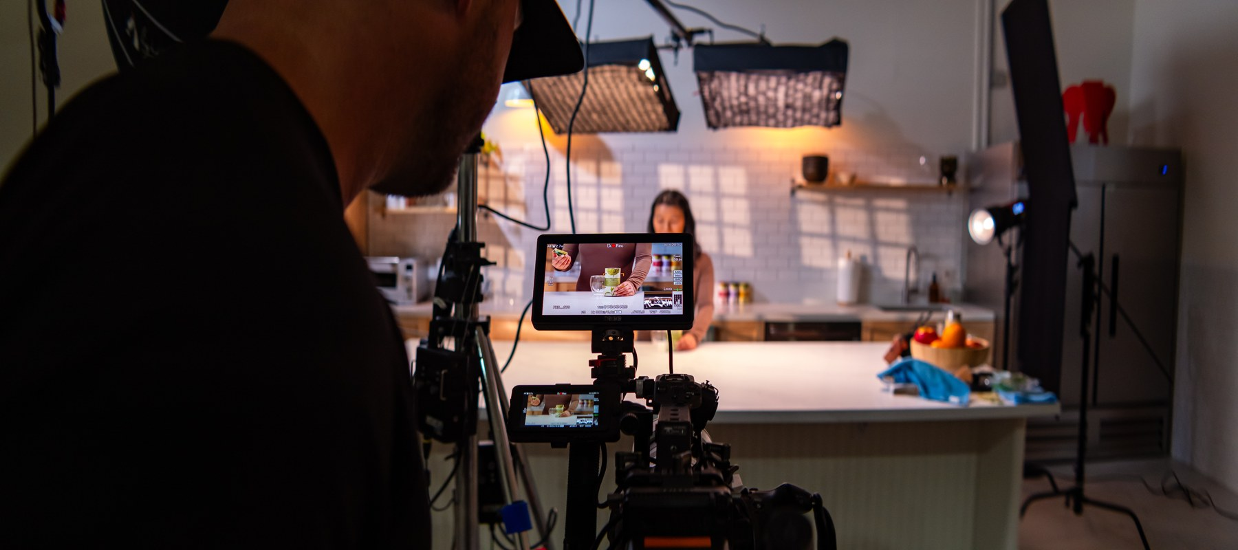 Working at the camera during product coverage.